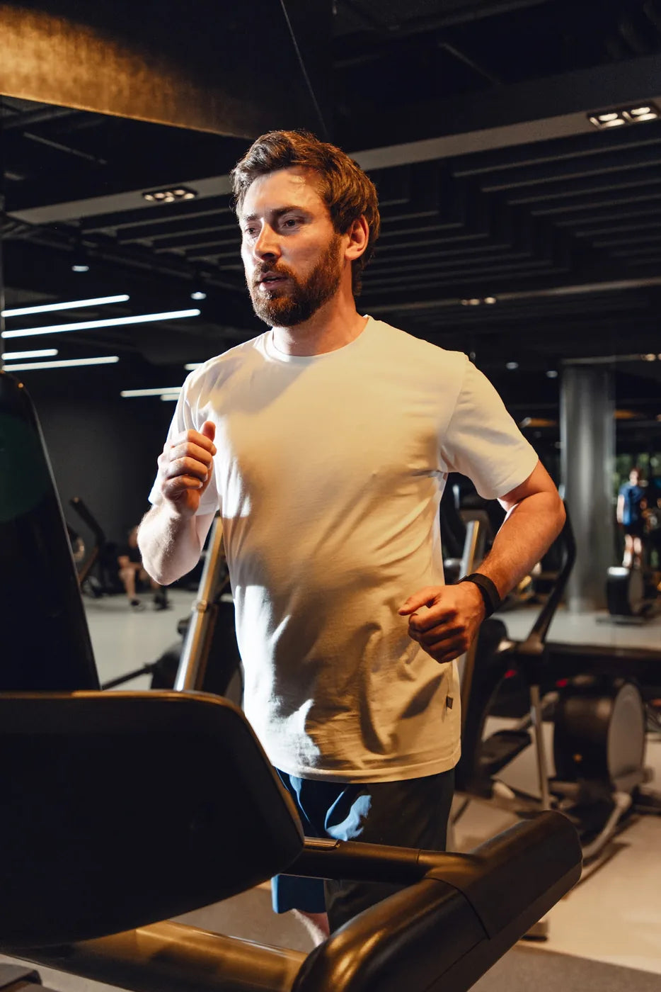 Person wearing a health band while exercising